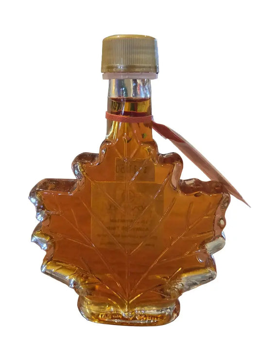 Maple leaf-shaped bottle of maple syrup custom favors - Honey Bee Naturals