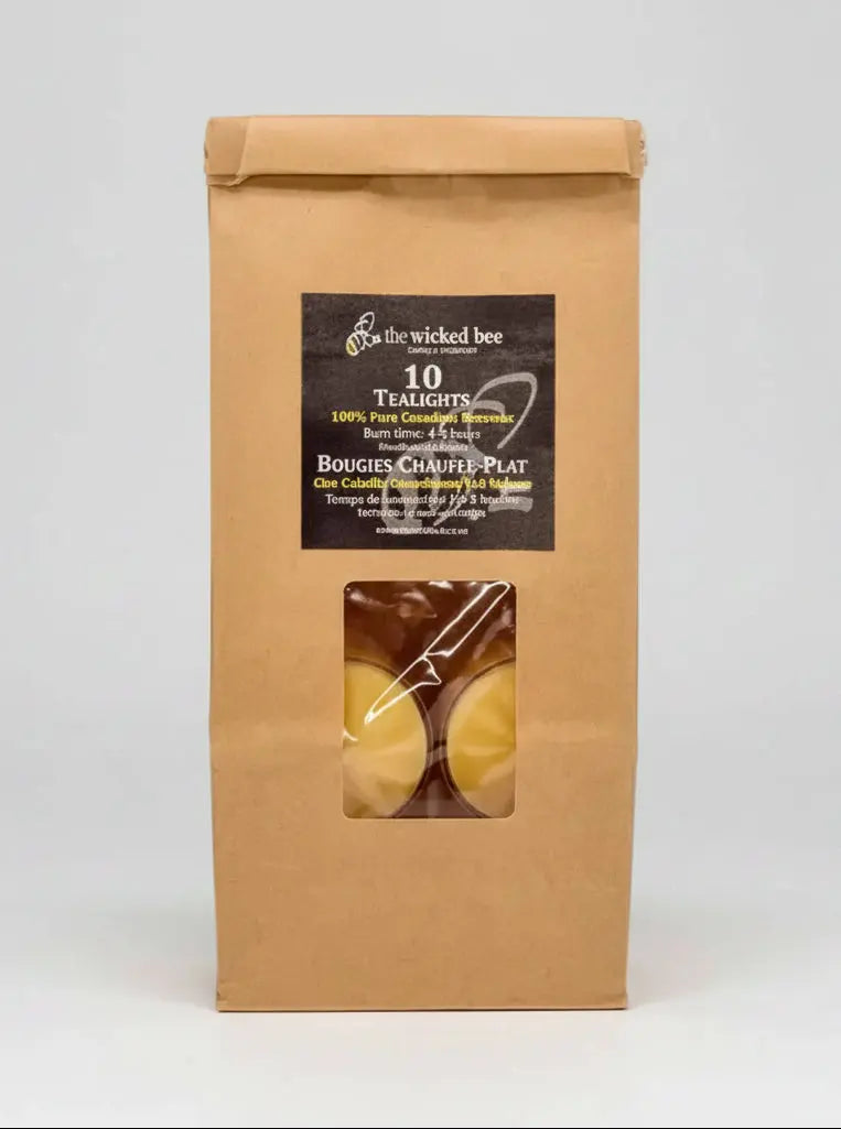 Kraft paper packaging with a window displaying Canadian Beeswax Tealights and a label on a white background